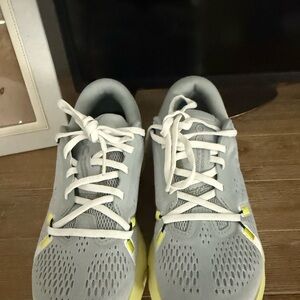 On Running Cloudsurfer Shoes in Gray and Yellow